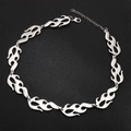 Silver punk flame link necklace with lobster clasp and extension chain on black background - 9 Segments Necklace