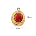 Macro shot of 12mm x 8mm oval gold pendant with a faceted red gemstone center - Style 1 - Red Agate