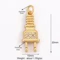 Creative gold plug pendant with white zircon stones measuring 20mm by 10mm - Gold-Plug