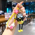 Sanrio Badtz-Maru keychain with yellow Sakura strap and pink flower charm on gold ring - Sakura Badtz-Maru (B471-6) / Single Piece