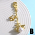 Variante porte-clés doré avec breloque abeille perle et détail d'étoile de mer - Style B-Abeille et Étoile de mer