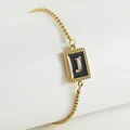 18K gold-plated titanium steel bracelet featuring a black enamel letter J pendant - Letter J (ZH497G-J-02)