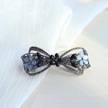 Elegant black bow hair clip with blue rhinestones and floral alloy spring clip - 6.5cm - Black Gray Resin Flower Bow Spring Clip