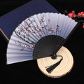 Grey gradient folding fan with plum blossoms, butterflies, black ribs and tassel - No. 40
