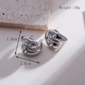 Silberne doppelstöckige Tropfenohrringe mit klarem Zirkonia und verdrehtem Design-Detail - Doppelter Wassertropfen Silber