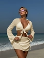 Detail of cream crochet three-piece beach set featuring mesh knit texture and lace-up design - S / Apricot