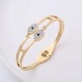 Bracciale a doppio malocchio in acciaio inossidabile dorato con cristalli pavé e molla - Oro