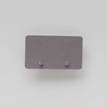 Macro view of dainty light purple zircon stud earrings in silver prong setting on card - July: Pale Purple