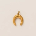 Detailed macro view of gold-plated horseshoe pendant with twisted texture finish - Half Moon Pendant