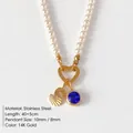 Elegant pearl necklace with 14K gold letter S and sparkling blue crystal charm - Letter S