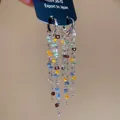Silver needle long tassel earrings with multicolored crystal heart studs and shiny finish - Silver Multicolor