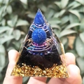 Orgone pyramid with blue lapis sphere and copper coil held in natural sunlight - QK33 Lapis Lazuli Ball Coil / 6cm
