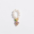 Macro detail of pearl charm necklace with a gold grape pendant featuring purple crystals - Pendant-Grape