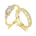 Elegantes goldfarbenes Ring-Set mit Marquise-Diamant und funkelnden Stapelringen - US 5 / Gold