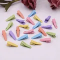 Vista dall'alto di mini fermagli per capelli da 2cm in colori macaron su sfondo bianco - Testa Rotonda / 2.4cm / Colori Misti