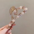 Close-up of heart-shaped hair claw clip with pink roses, pearls and gold glitter resin - Heart Pink Pearl Rose