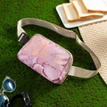 Detailed macro view of pink marble pattern belt bag with durable nylon strap and buckle - Purple Sweet Potato