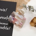 Detailed view of a square marble texture hair claw clip with warm decorative accents - 8# Pink Grey Cloud Marble
