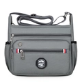 Bolso bandolera de nailon gris con diseño multibolsillos y correa ajustable - Gris