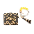 Black sunflower card wallet and beaded silicone bracelet keychain with yellow tassels - Sunflower