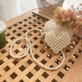 Handmade heart-shaped pearl crossbody bag in white with a matching long pearl strap - Pearl Heart Bag Finished