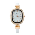 Fashionable oval quartz watch with rhinestone bezel, shell dial and white leather strap - White