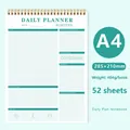 A4 mint green daily planner notebook with gold coil binding and goal tracking sections - A4 Daily Plan - Pea Green