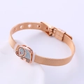 Pulsera de malla en oro rosa tipo reloj con un colgante de elefante de circonita - Oro rosa