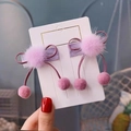 Detail of pink and purple faux fur hair clips with ribbons on a Princess display card - Purple (1 Pair BB Clips)