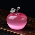 Detailed view of pink crystal apple decor with silver leaves on carved wooden base - Pink Cat's Eye Apple / 4.5*4.2cm