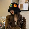 Black hand-knitted bucket hat with colorful crochet sunflowers for a retro bohemian style - M (56-58cm) / Six Flowers Black