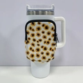 Close-up of white 40oz tumbler with a sunflower neoprene sleeve and zipper detail - No. 11 Sunflower
