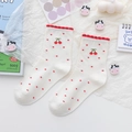 Off-white crew socks with red cherry pattern and decorative ruffle trim for women - One Size / Cherry
