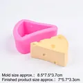 Pink silicone mold for triangle cheese candle making with yellow sample model - Medium Triangle / Pink