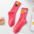 Chaussettes roses avec bords côtelés ornées d'un patch smiley jaune et lettres brodées - Taille unique / Rose