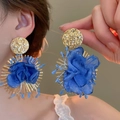 Detail of blue mesh flower earrings with gold hammered studs worn on the model's ear - Gold Hammered Metal Disc Blue Fabric Sunflower Earrings (21# Silver Needle-Gold-Blue)