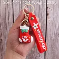 Christmas stocking PVC keychain featuring snowman and holly, with red silicone wristband - Christmas Stocking-4