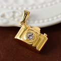 Macro shot of gold-plated camera pendant with sparkling crystal inlay on a soft background - Zirconia Camera - Gold