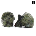 Hand-carved 1-inch dragon blood stone skull figurine with green and brown textures - Dragon Blood Stone