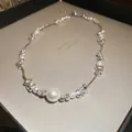 Irregular silver beads and pearl necklace with a luxurious liquid metal拼接 design - Silver Necklace