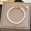 Elegant gold clover bracelet with white pearls and adjustable stainless steel chain - Gold Pearl Extension Style (5280)