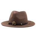 Detail eines dunkelbraunen Fedora-Strohhuts mit Webband und Vintage-Blumenschnalle - M (56-58cm) / Braun