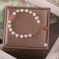 Elegant freshwater pearl bracelet with pink stones and golden OT buckle closure - Pink Style Natural Pearl Bracelet