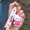 Hello Kitty keychain with pink dress, 3D character pendant and silicone strap - Hello Kitty-Pink Skirt with Bow