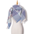 Women's plaid tassel shawl scarf in blue color block pattern on a studio model - Sky Blue Plaid