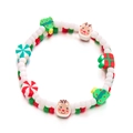 Détail de bracelets de Noël colorés avec pendentifs sapin, renne et bonbons festifs - Couleur Mélangée d'Éléments de Noël