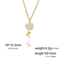 Halskette mit lila Blütenanhänger und Goldrand aus hochwertigem Edelstahl für Damen - Goldfarbe - Mohnblume