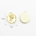 Detailed view of gold-tone oval rose pendants with 23mm height and 17mm width specs - Gold