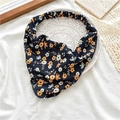 Navy blue floral elastic headband with yellow and white flowers on a white plate - Black Floral
