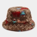 Close-up of thick plush bucket hat showing brown faux fur texture and colorful animal pattern - M (56-58cm) / Brown/Geometric Animal Pattern